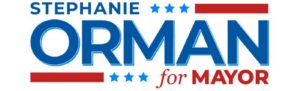 Campaign sign reading "Stephanie Orman for Bentonville Mayor" with blue and red stars.